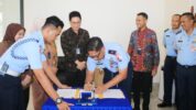 Lanud Sultan Hasanuddin dan PT. Bank Mandiri, Tbk., Jalin Kerja Sama dengan menandatangani Nota Kesepahaman dan Perjanjian Kerja Sama